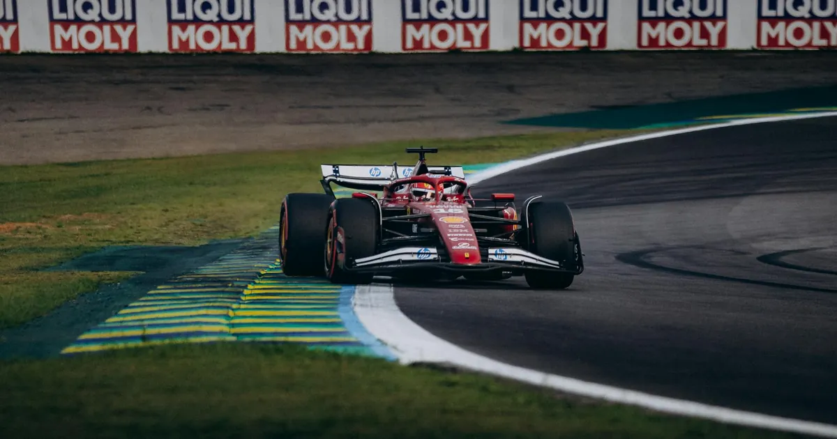 High-speed Formula 1 racing at Interlagos Circuit, São Paulo, Brazil.