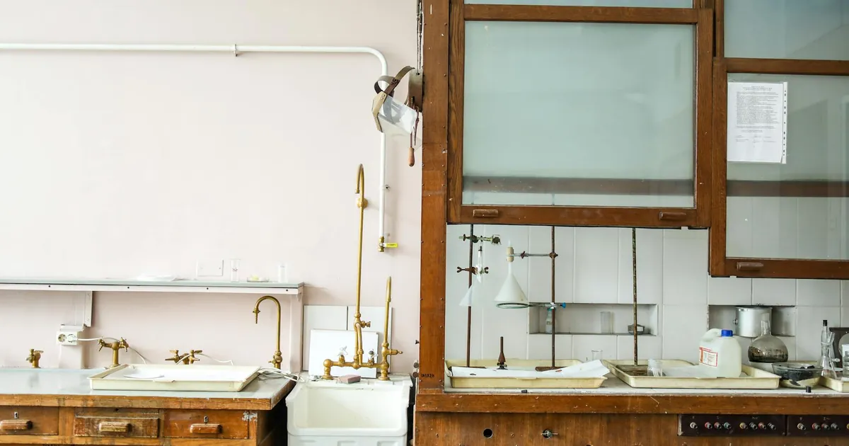 A vintage laboratory interior showcasing classic equipment and workstations.