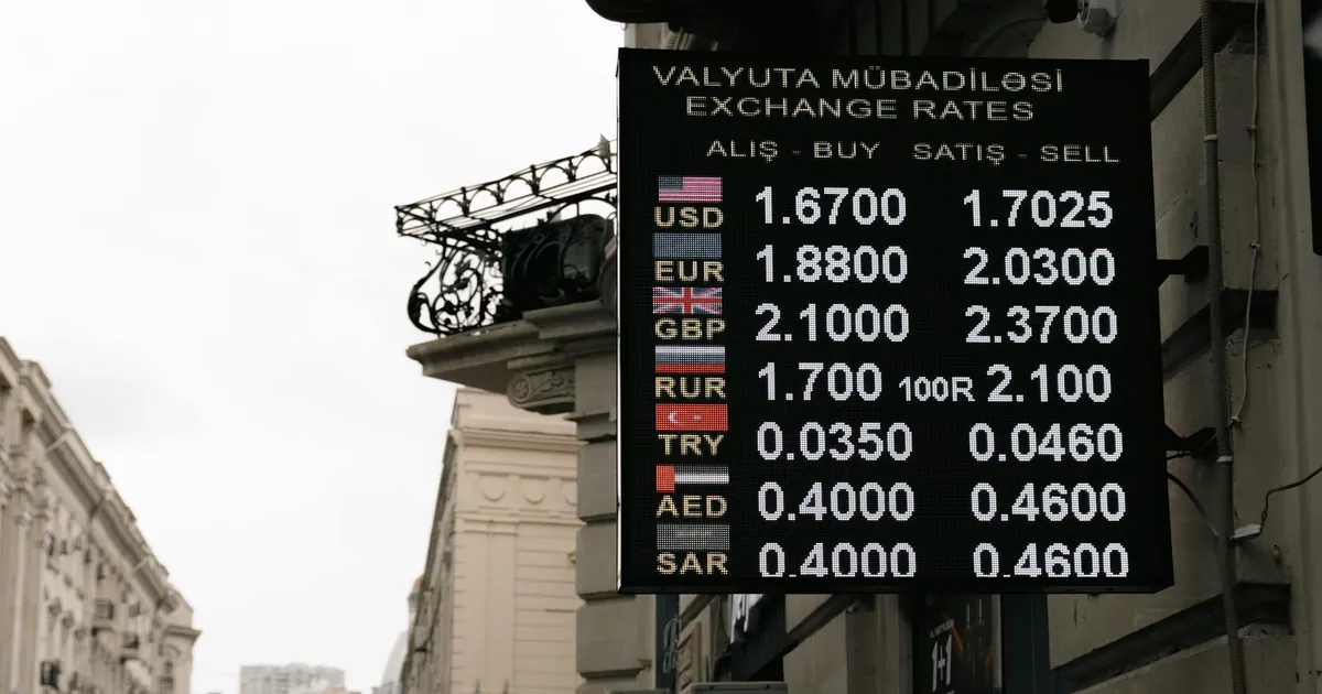 Currency exchange rates sign on a street in Baku, Azerbaijan.