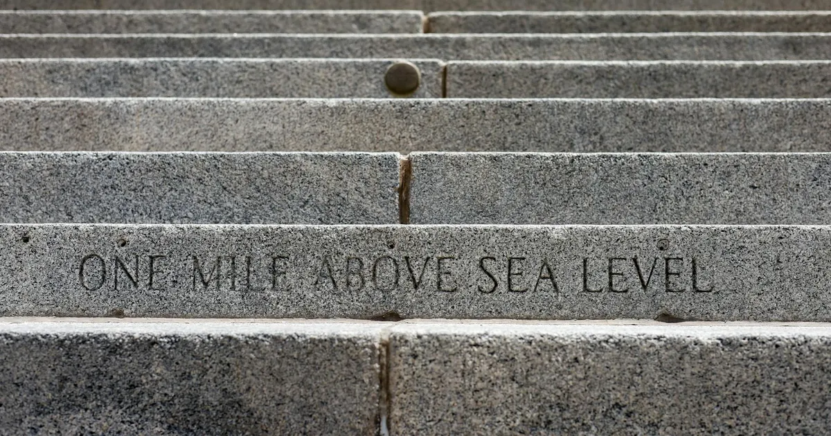 Granite steps with 'One Mile Above Sea Level' engraving at Denver's Capitol Building. Granite steps with 'One Mile Above Sea Level' engraving at Denver's Capitol Building.