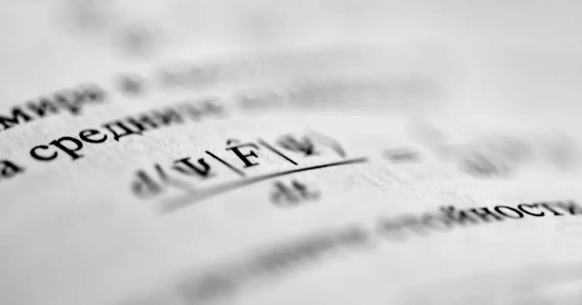 a close up of a piece of paper with writing on it