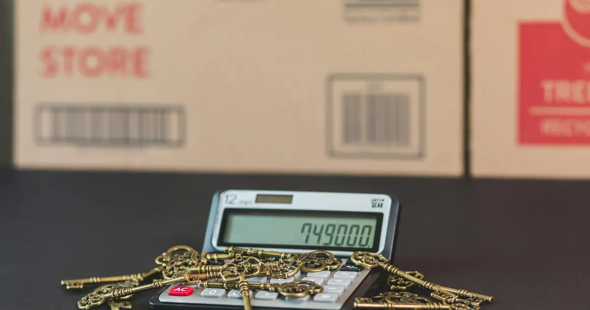 A calculator with vintage keys symbolizes real estate investment and mortgage calculations.